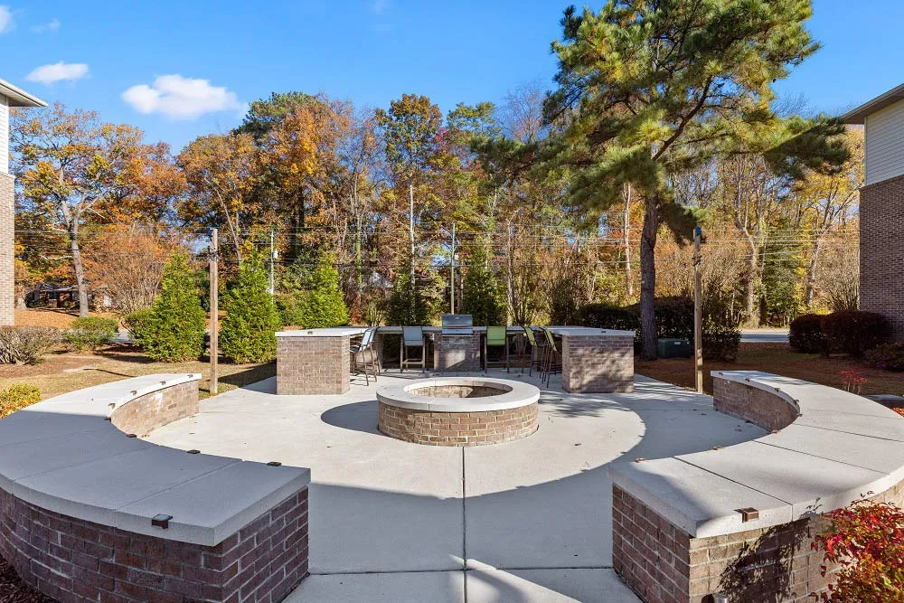pet friendly two bedroom student apartments walking distance to ECU greenville nc grilling area at The Quarterdeck
